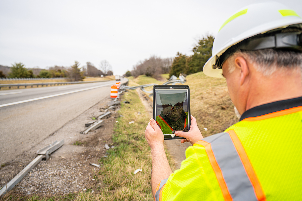 PILLAR Employee Taking Photo of Guardrail Wreck